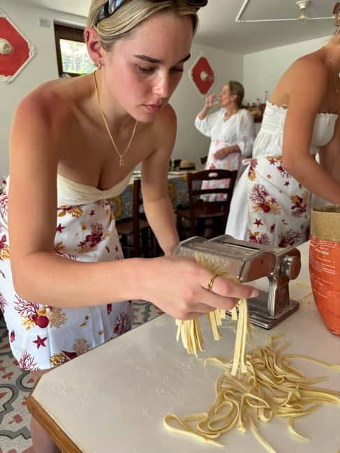 Amalfi Coast: Mozzarella, Pasta and Tiramisù Cooking Class - Sitting down to eat what you made