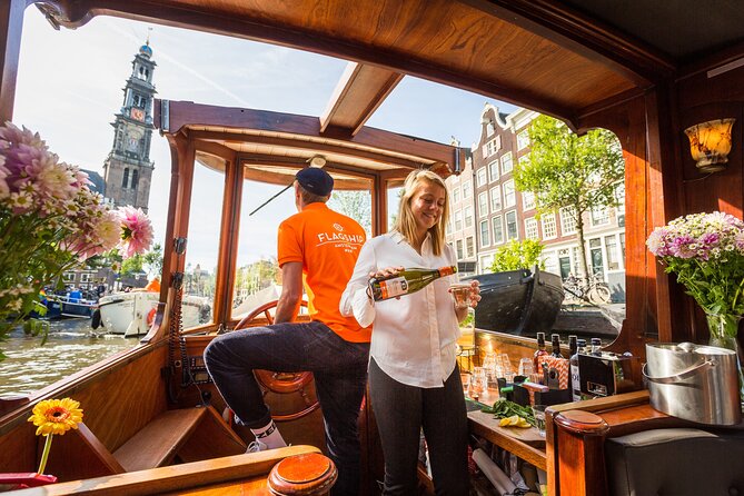 Amsterdam Canal Cruise in Classic Salon Boat With Drinks and Cheese - Boarding the classic salon boat