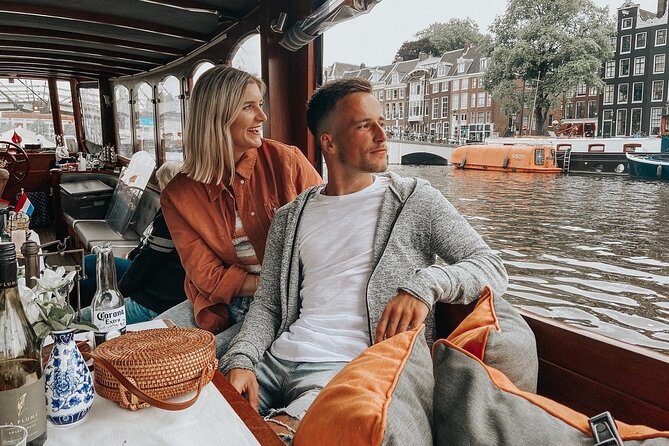 Amsterdam Canal Cruise in Classic Salon Boat With Drinks and Cheese - Timing matters more than usual