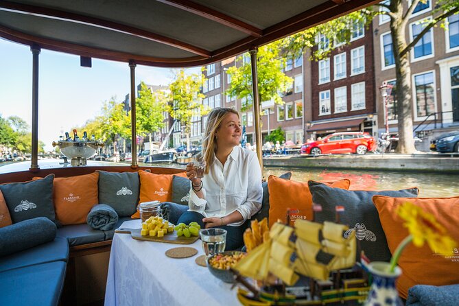 Amsterdam Canal Cruise with Cheese and Wine - Munttoren, Flower Market, and the Inner Canal