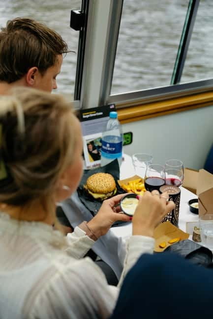 Amsterdam canal cruise with culinary burger or cheese & wine - Magere Brug and the eastern canal sights
