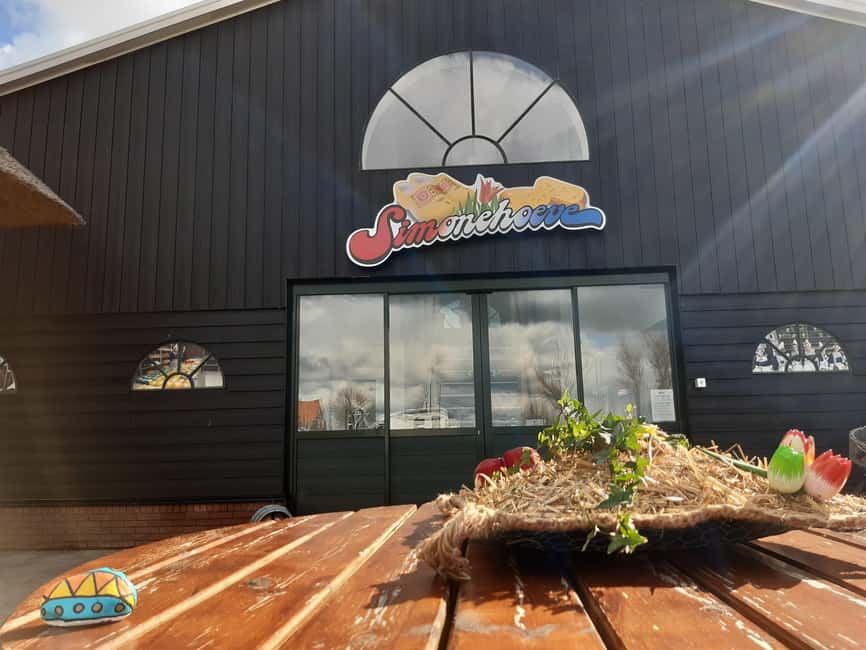 Amsterdam: Cheese, Clogs, Flowers and Windmills Tour - Cheese, clogs, and tasting at Simonehoeve
