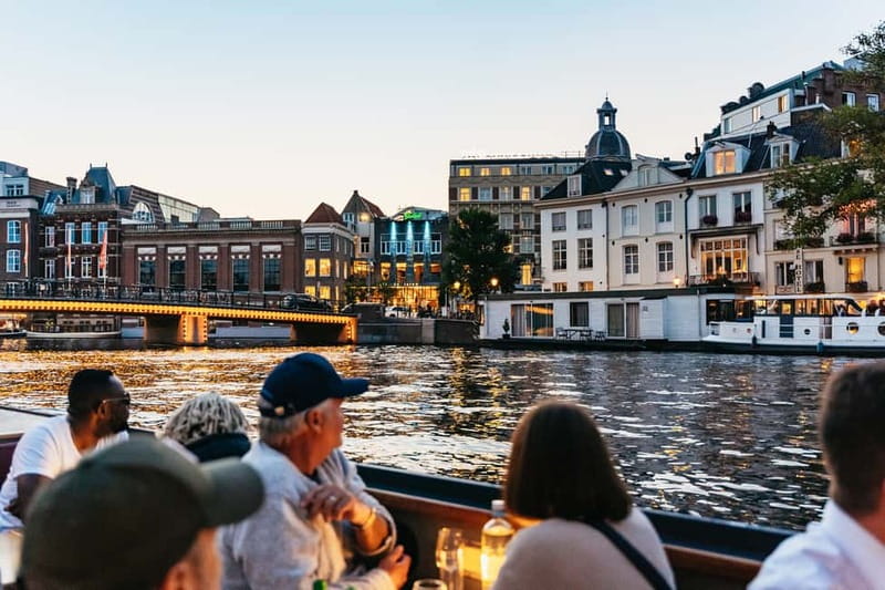 Amsterdam: Cozy Cheese & Wine Cruise Tasting Experience - Unlimited wine, beer, and soft drinks