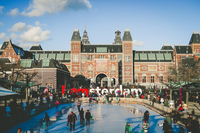 Amsterdam Day Trip from Brussels With Cheese, Clogs and Windmills - Guides, language, and group management