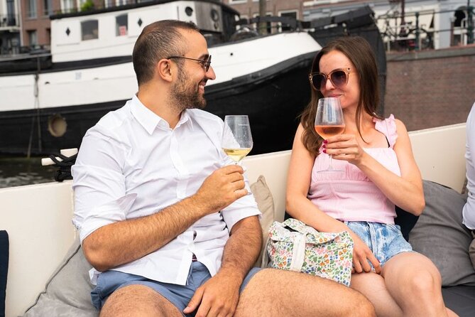 Amsterdam: Evening Candle Light Cruise With Wine & Cheese - From the Red Light District to the eastern harbour views