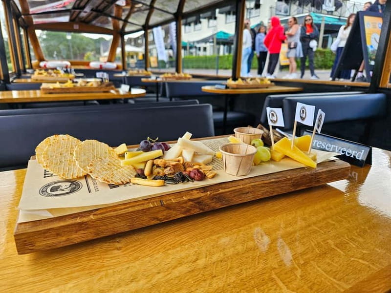 Amsterdam: Live GuideD Giethoorn Boat Tour & Cheese Platter - Meeting in Central Amsterdam
