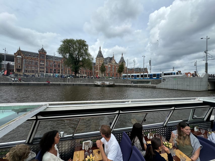 Amsterdam: Luxury Cheese & Wine Canal Cruise - Dutch cheese, crackers, grapes, and a dip