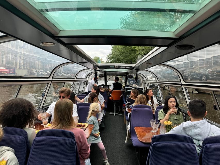 Amsterdam: Luxury Cheese & Wine Canal Cruise - The atmosphere: intimate, romantic, and not overly formal