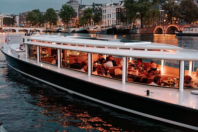 Amsterdam Small-Group Evening Canal Cruise Including Wine, Craft Beer, Cheese - Cruising Amsterdam after dark