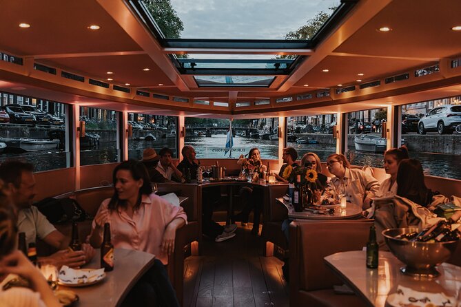 Amsterdam Small-Group Evening Canal Cruise Including Wine, Craft Beer, Cheese - Historic sights from the canal