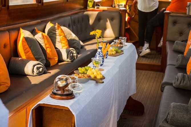 Amsterdam Walking Tour and Cruise with Drinks and Cheese Tasting - The Chinese Quarter and Nieuwmarkt