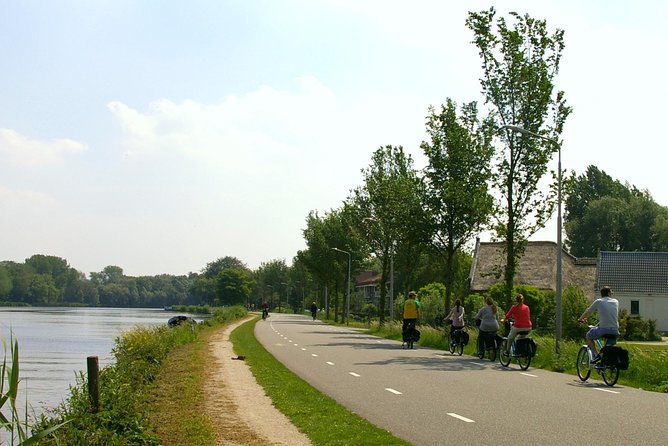 Countryside Bike Tour from Amsterdam: Cheese, Clogs & a Windmill - Waterland’s canals, cows, and wide-open fields