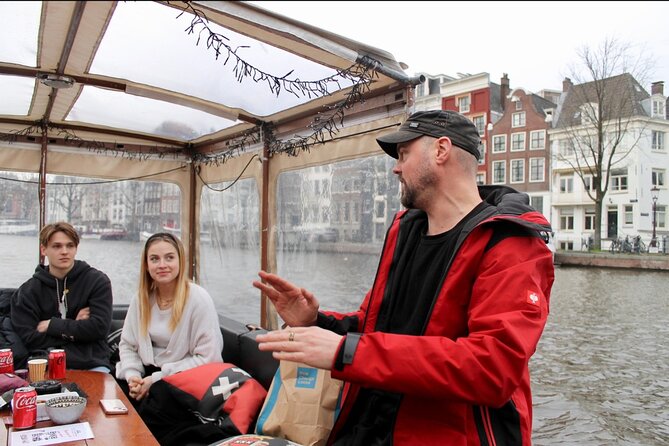 Dutch Cheese & Drinks Guided Amsterdam Boat Tour, All Inclusive - Oude Kerk and Amsterdam’s unexpected contrasts