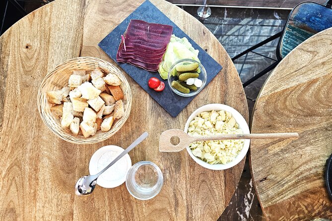 Experience Making Your Own Swiss Fondue in Geneva - The opening plate: charcuterie, cheese, and a little time to settle in