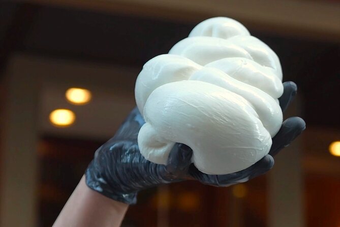 Florence: Mozzarella Cheese Making with Wine and food Tastings - Turning curds into bocconcini, nodini, and treccine