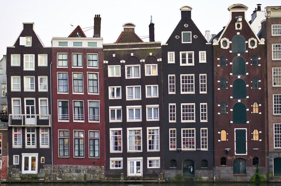 From Brussels: Cheese, Clogs & Windmills Amsterdam Day Trip - The canal cruise and extra costs