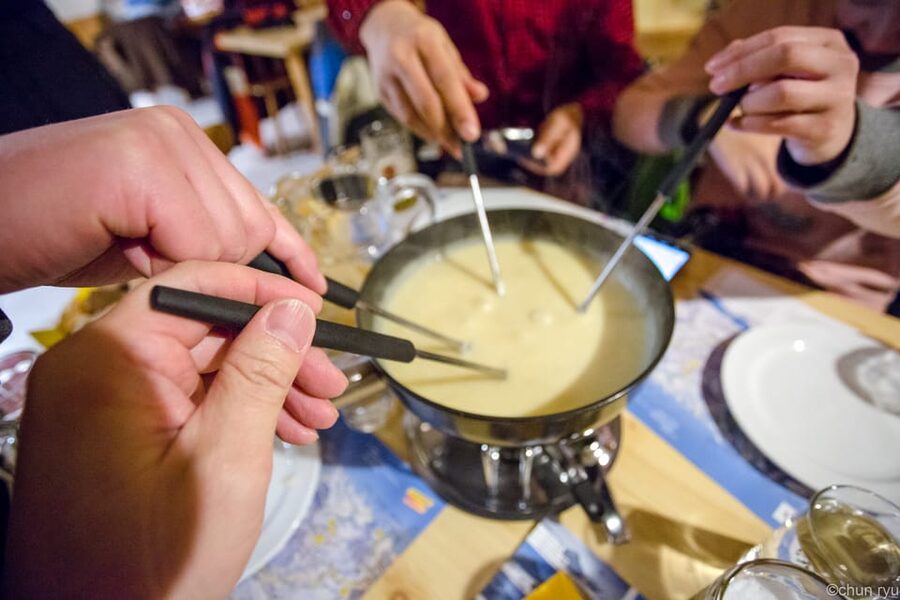 From Interlaken: Night Sledding with Cheese Fondue Dinner - Booking, cancellation, and language details