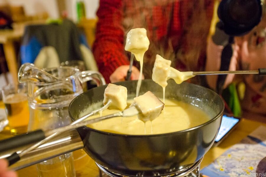From Interlaken: Night Sledding with Cheese Fondue Dinner - Fondue after the cold