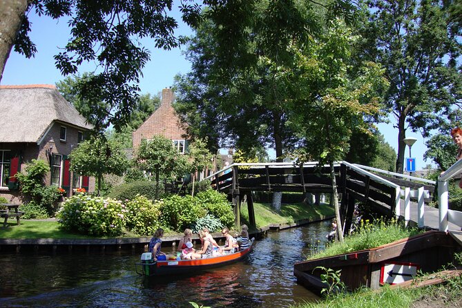 Giethoorn Day Trip from Amsterdam With Cruise and Cheeseplatter - Guide quality, language, and group size