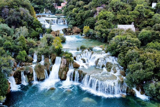 Krka Waterfalls & Wine and Cheese Tasting Tour from Split - Walking through Krka National Park