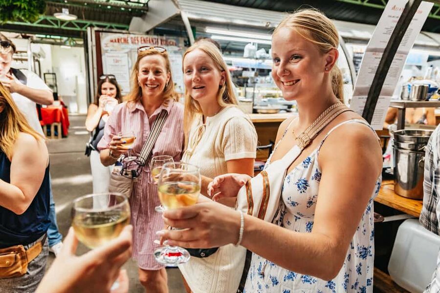 Le Marais Walking Food Tour with Cheese, Wine & Pastries - Cheese, charcuterie, and the French way of eating