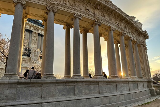 Madrid Bike Tour with Churros and Wine, Ham, and Cheese Upgrade - Puerta de Alcalá and Madrid’s old city edge