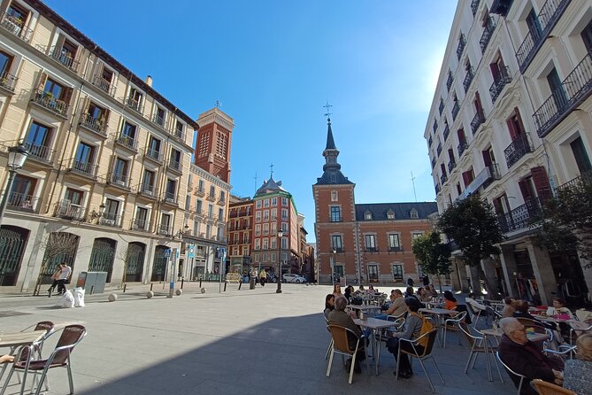 Madrid Bike Tour with Churros and Wine, Ham, and Cheese Upgrade - Gran Vía architecture and the Money Heist connection
