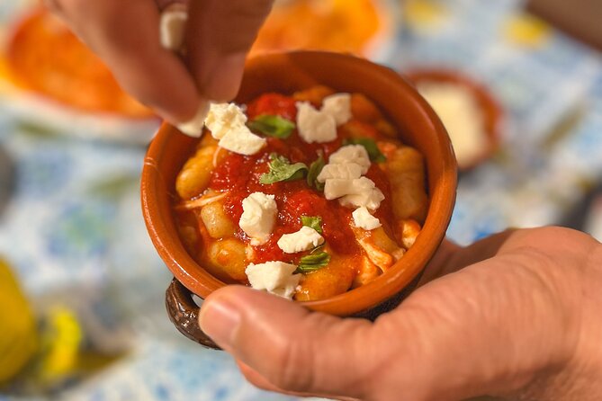 Mozzarella experience with private cooking class - Turning milk into warm mozzarella