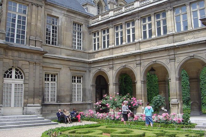Paris Le Marais Historical Walking Tour with Wine and Cheese Tasting - The Wall of Philip II Augustus