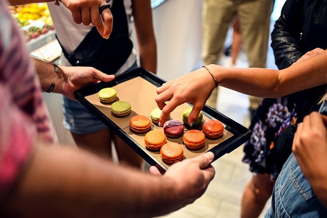 Paris St Germain Food Tour with Cheeses, Foie Gras, Wines & More - Starting at Le Bon Marché and entering Saint-Germain