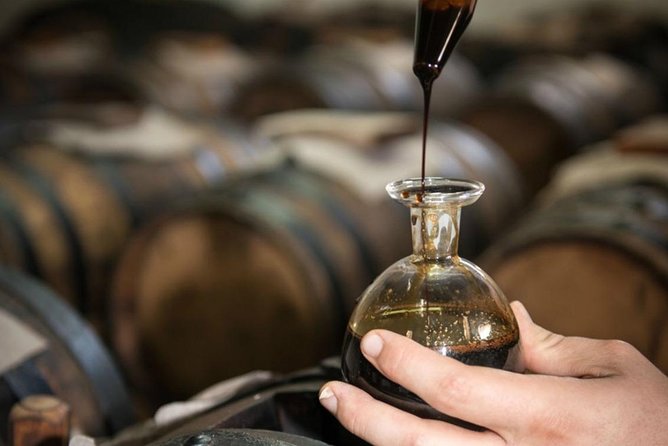 Parmigiano & Balsamic Artisans: In-Depth Private Tour and Tasting - Entering a Traditional Balsamic Vinegar house in Reggio Emilia