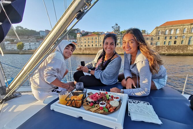 Porto: Wine and cheese tasting on a sailboat on the Douro River - Wine, Douro bottles, and three styles of Port