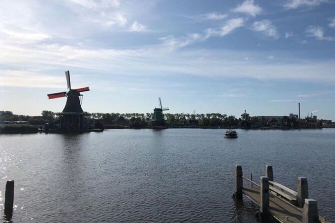 Private Sightseeing Tour to Windmills Cheese Farm and Volendam - Jacobs Hoeve: Gouda, samples, and cows