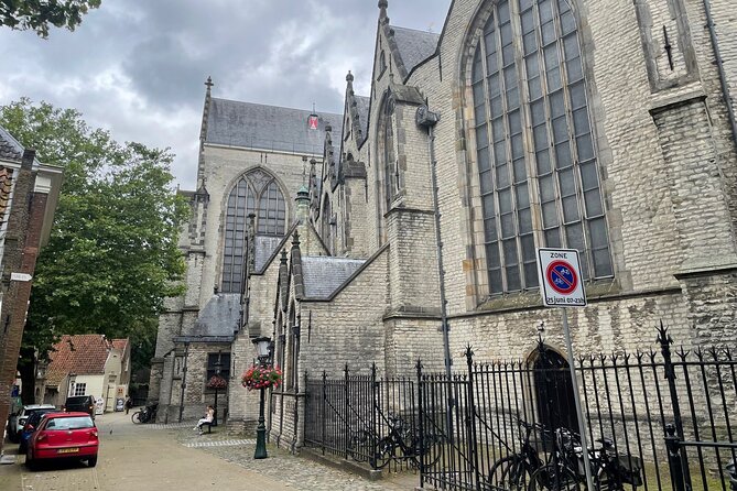 Self-Guided Walking Tour of Gouda: Canals, Colonies, and Cheese - Gouda’s Gothic city hall and Saint-John Church