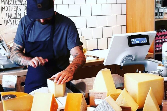 Taste London: Cheese Tasting & Walking Tour - Walking through Little Italy with cheese in hand