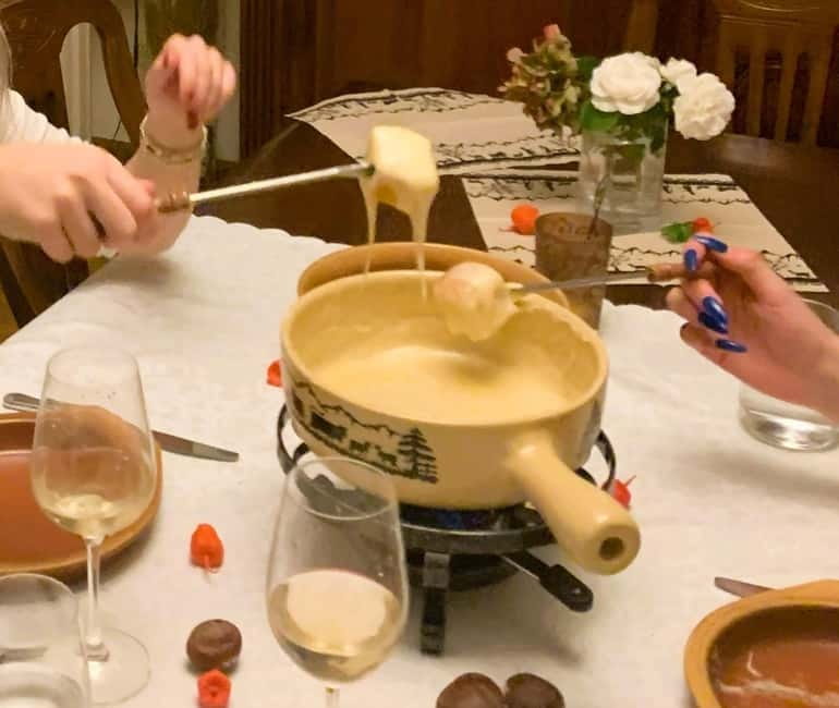 Traditional Swiss Dinner: Cheese Fondue, Appetizers/Dessert - Fabio and Anita make the social side count