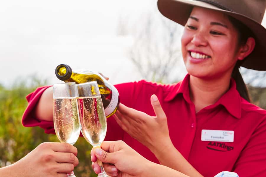 Uluru: Sunset, Sparkling Wine, Cheeseboard & Gourmet BBQ - Arriving before sunset at Uluru National Park