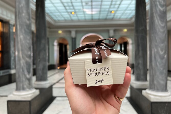 Zurich Food Tour with 10 Local Delicacies, Cheeses & Chocolates - Zurich sausage, sauerkraut, and rösti