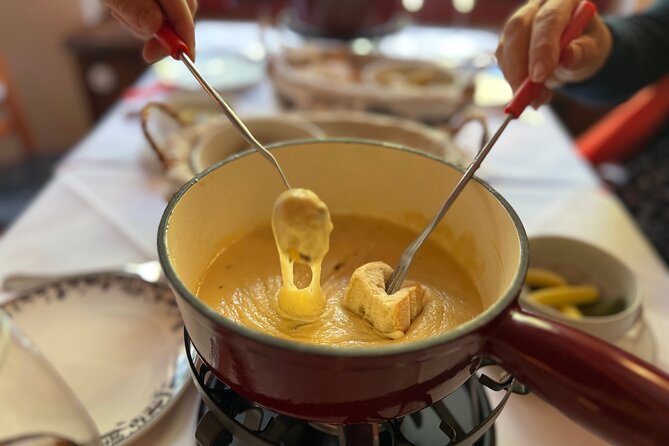 Zurich Food Tour with 10 Local Delicacies, Cheeses & Chocolates - Cheese, fondue bites, and Chäschüechli