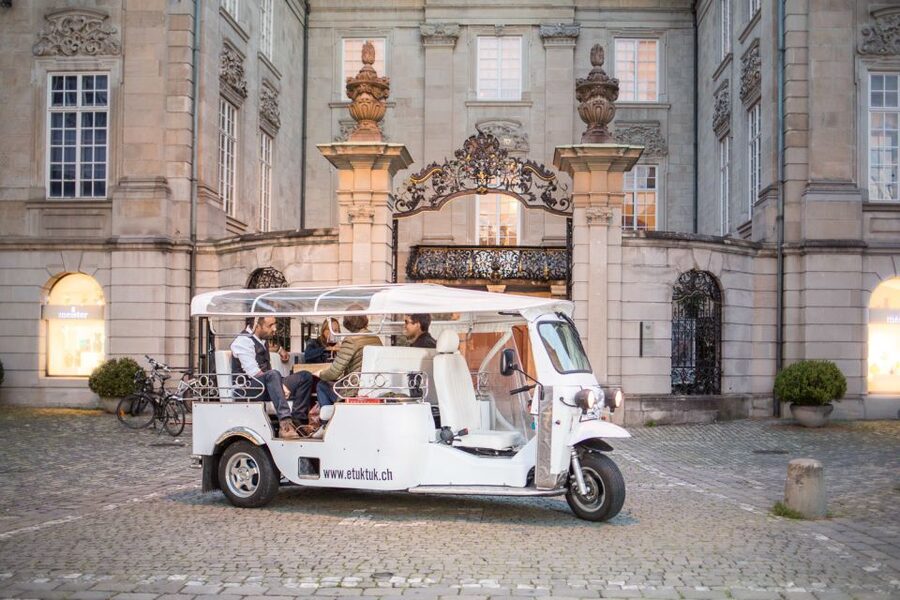 Zurich: Swiss Cheese Fondue & Wine e-Tuk-Tuk City Tour - The old town from a three-wheel seat