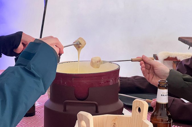 Zurich to Lucerne and Titlis Tour with Igloo Fondue Experience - Riding the Titlis Rotair to the summit